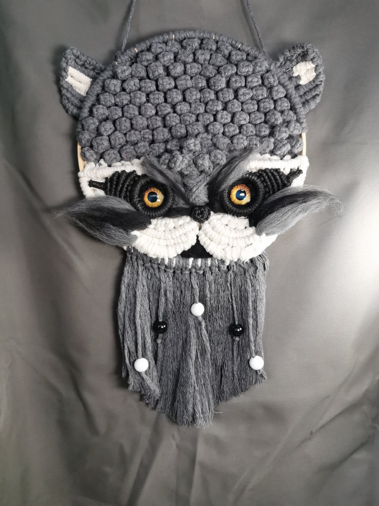 Wandschmuck Makramee Waschbär