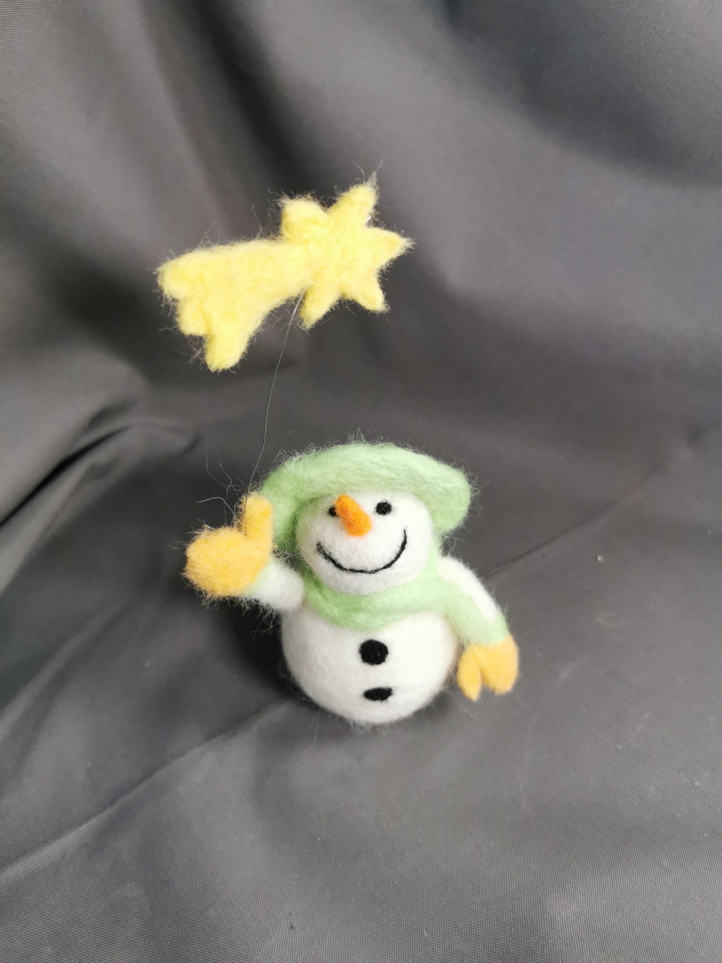 Schneemann mit Stern