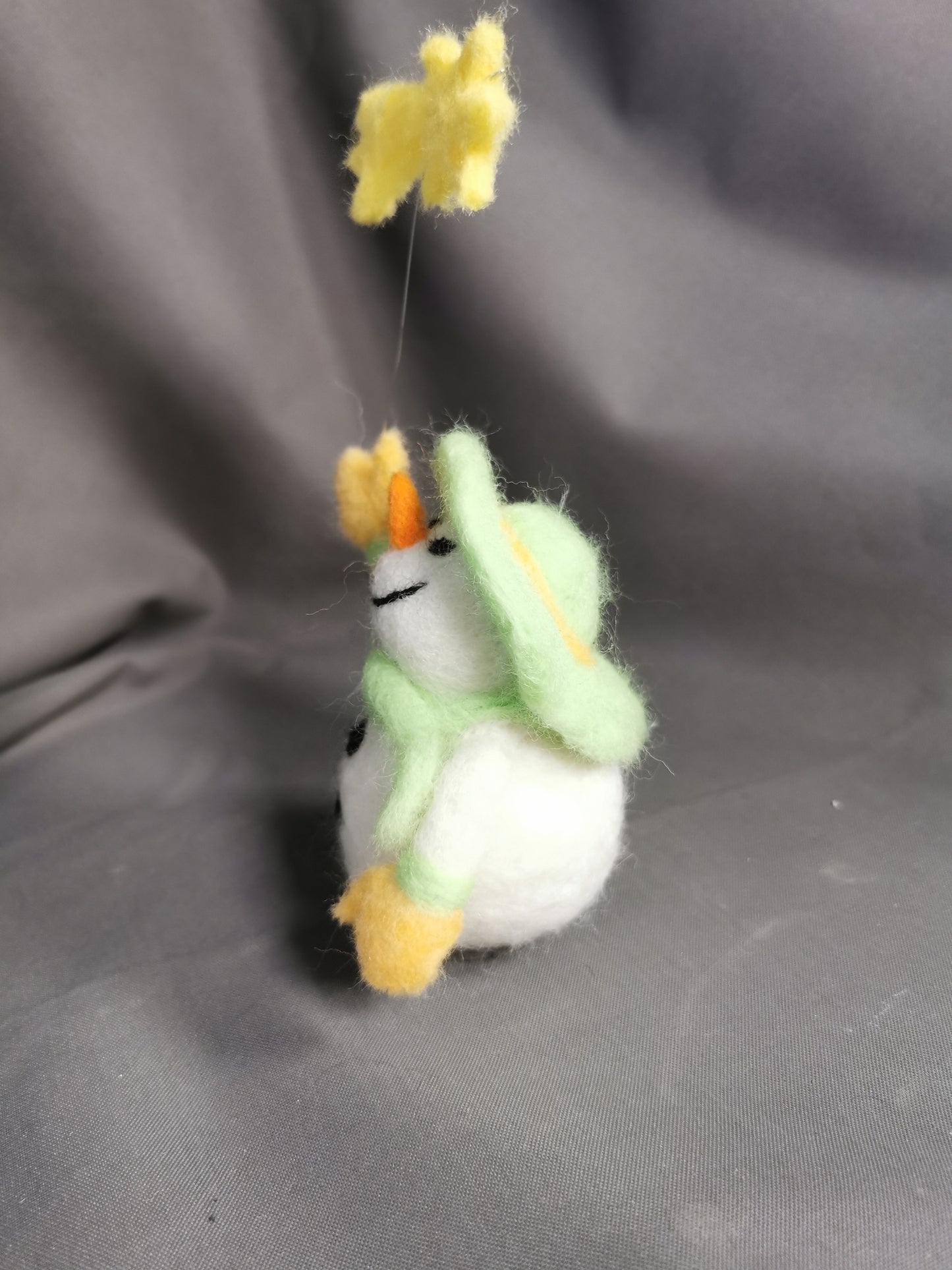 Schneemann mit Stern